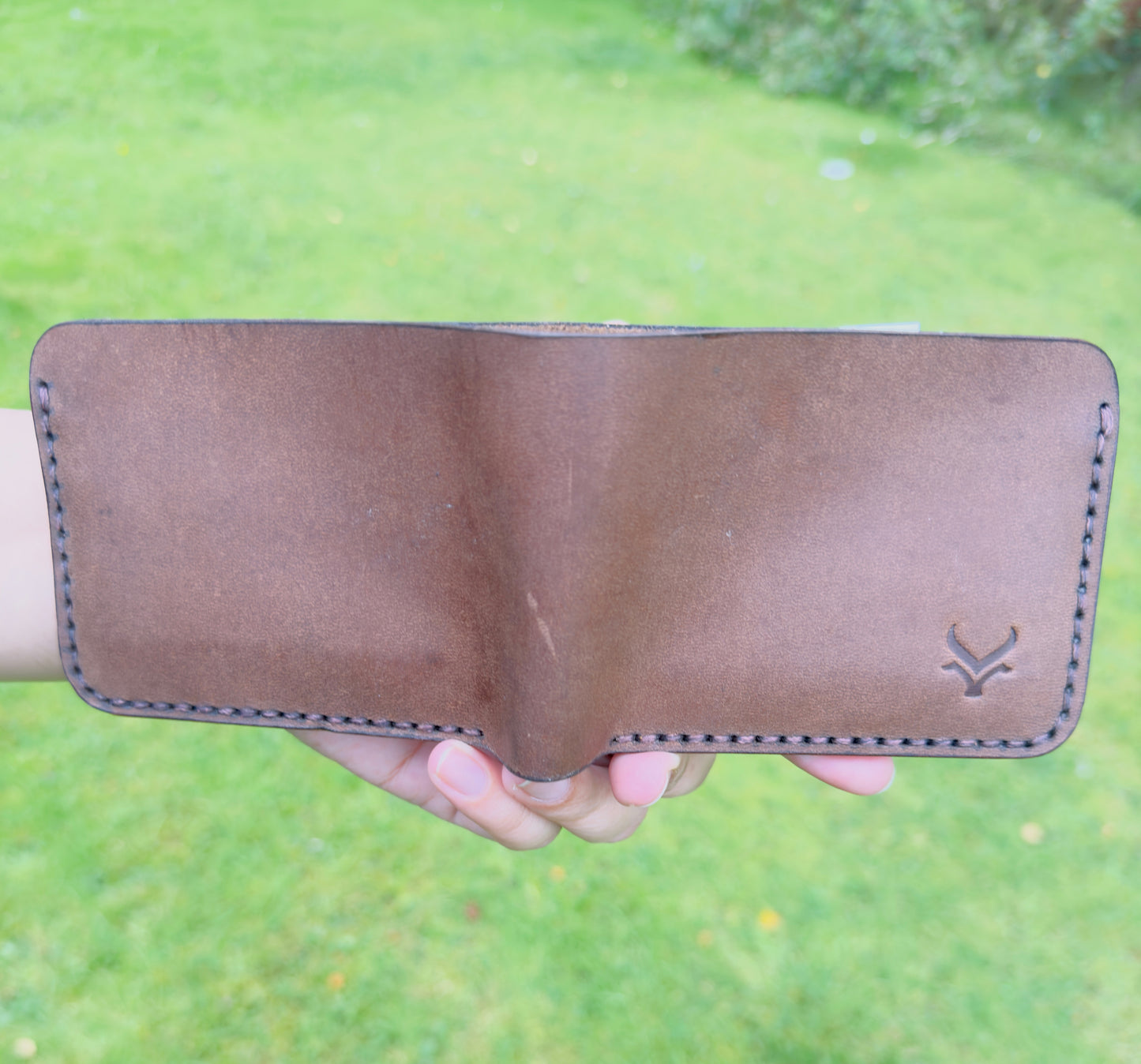 The Timeless: A brown leather Bifold Wallet